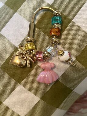 Gold-tone Charm Keyring with Pink Dress and Multicolor Beads